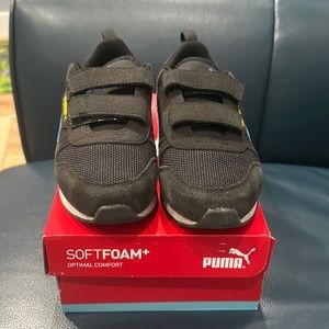 Puma Kids Black Sneakers with Blue and Yellow Accents